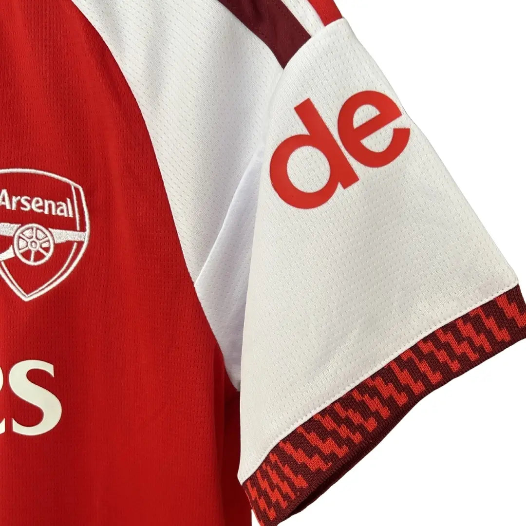 Camiseta de fútbol local del Arsenal #26 Campeones 2026/27 con escudo