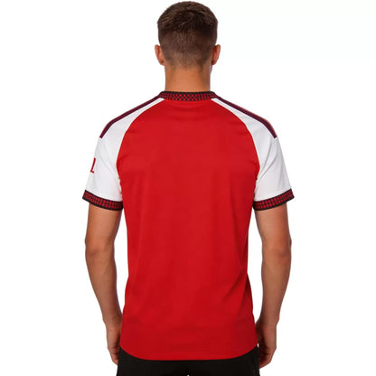 Camiseta de fútbol local del Arsenal #26 Campeones 2026/27 con escudo