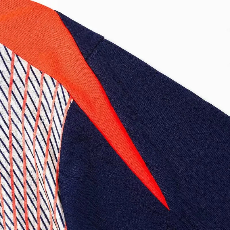 Chándal infantil Barcelona con cremallera de 1/4, temporada 2025/26, negro y naranja