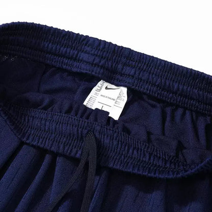 Chándal infantil Barcelona con cremallera de 1/4, temporada 2025/26, negro y naranja